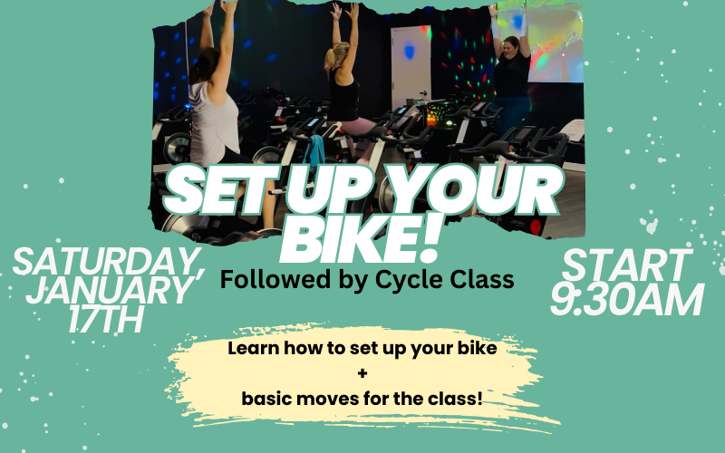 Indoor cycle class participants learning how to set up bikes at The Fitness Equation South Riding 